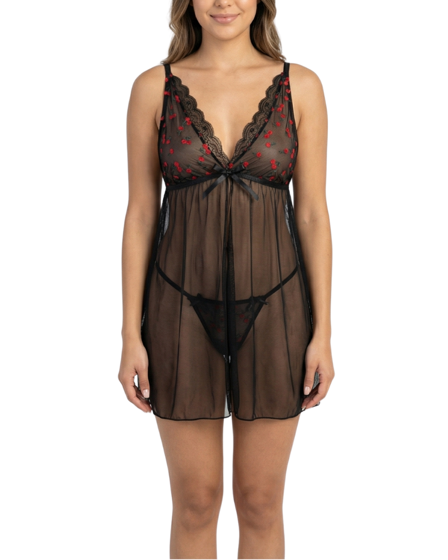 Woman wearing a black lace lingerie set on a white background