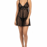 Woman wearing a black lace nightgown on a white background