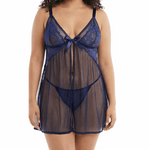 Woman wearing a navy blue lace nightgown on a white background
