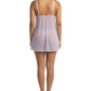 Woman wearing a sheer nightgown on a white background