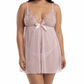 Woman wearing a light pink lace nightgown on a white background