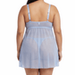Woman wearing a sheer baby blue nightgown on a white background