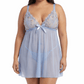 Woman wearing a light blue lace nightgown on a white background