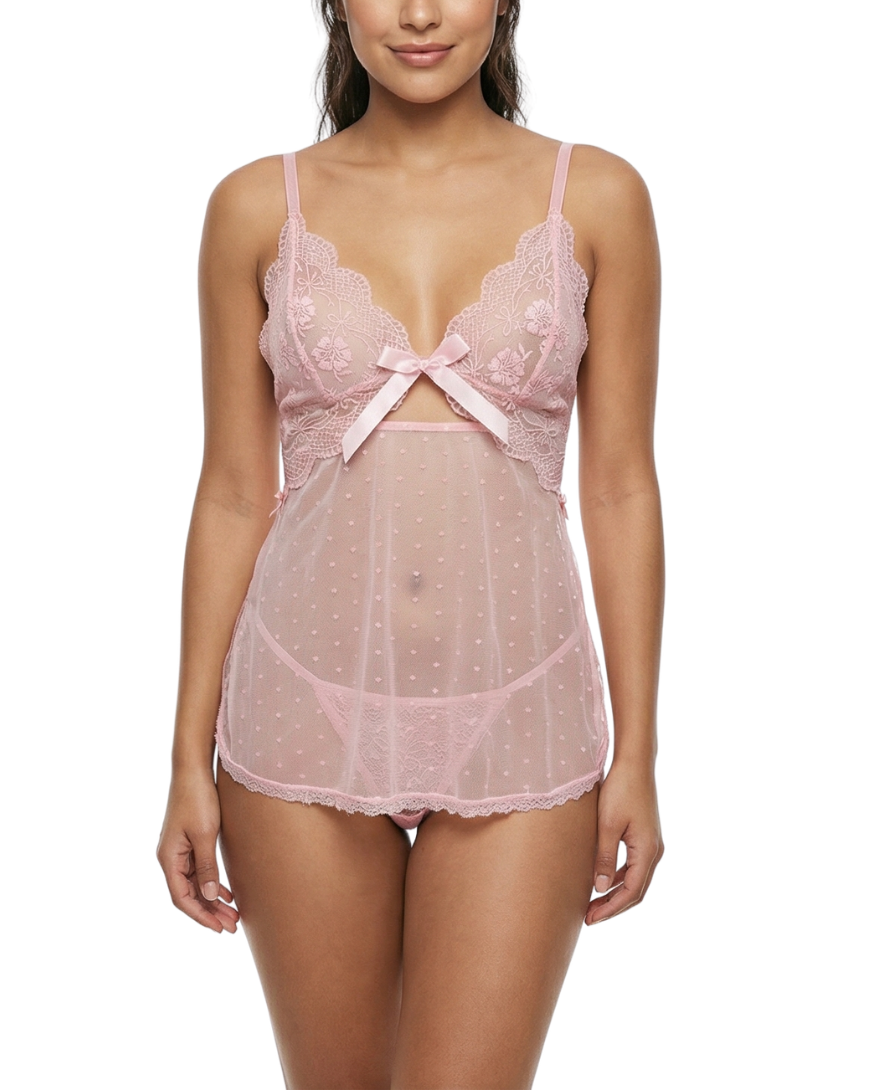 Woman wearing a pink lace lingerie set on a white background