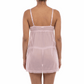 Woman wearing a sheer pink nightgown on a white background