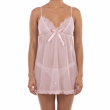 Woman wearing a sheer pink nightgown on a white background