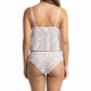 Woman wearing a white floral lingerie set on a white background