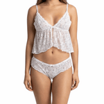 Woman wearing a white lace lingerie set on a white background