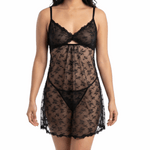 Woman wearing a black lace lingerie set on a white background