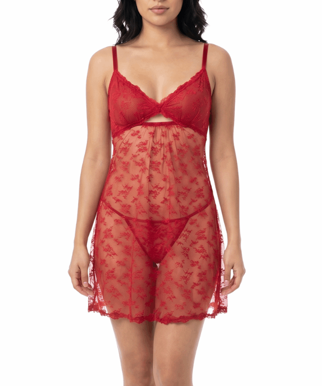 Woman wearing a red lace nightgown on a white background