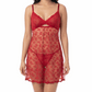Woman wearing a red lace nightgown on a white background