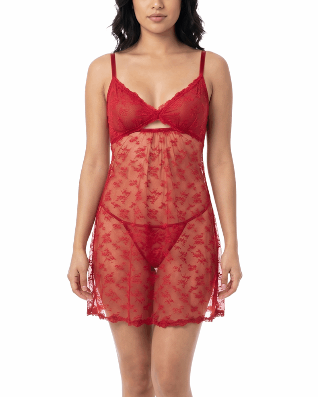 Woman wearing a red lace nightgown on a white background