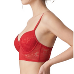 Woman wearing a red bra on a white background