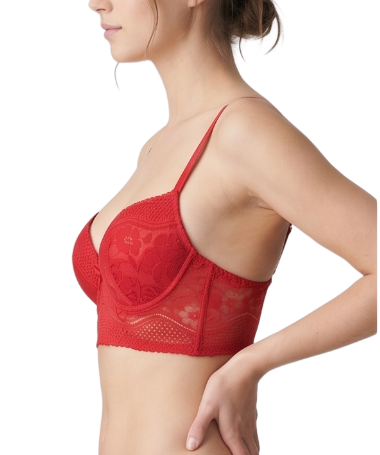 Woman wearing a red bra on a white background