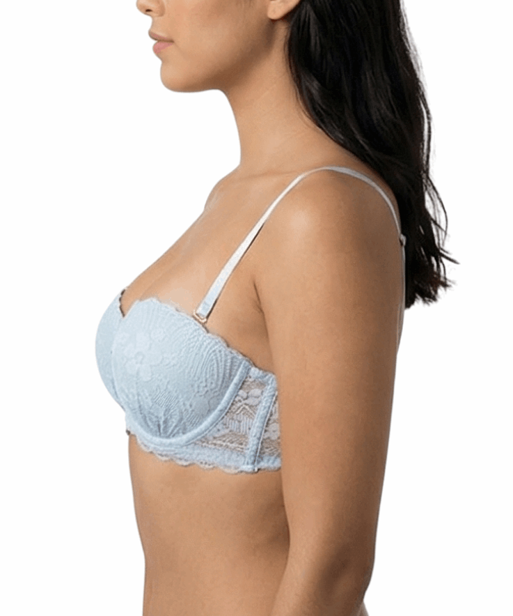 Woman wearing a light blue bralette on a white background