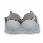 Baby blue and gray bra with lace trim on a white background