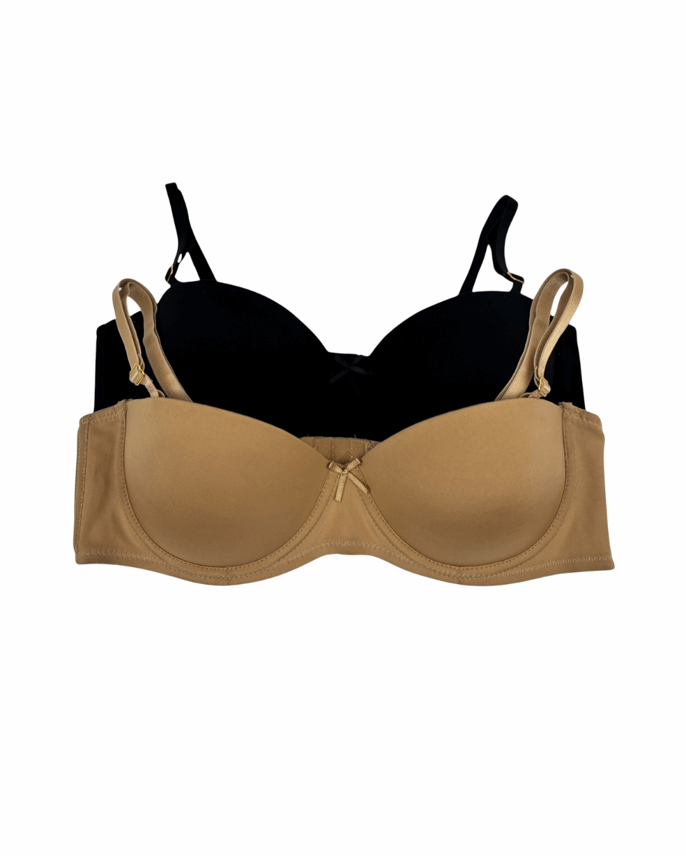 Beige bra with black underwire on a white background