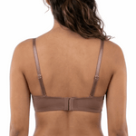 Model wearing a mocha bra on a white background