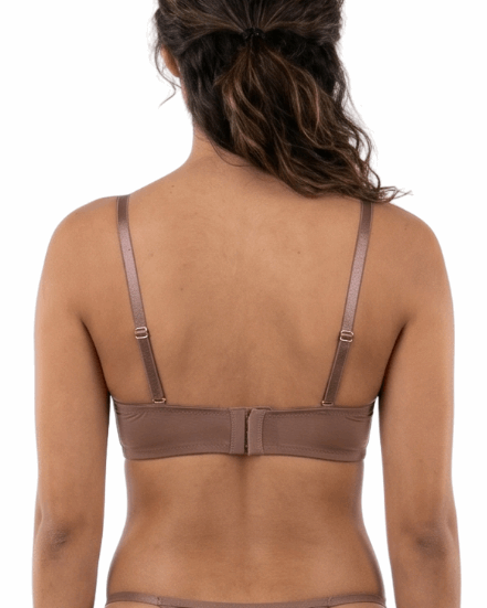 Model wearing a mocha bra on a white background