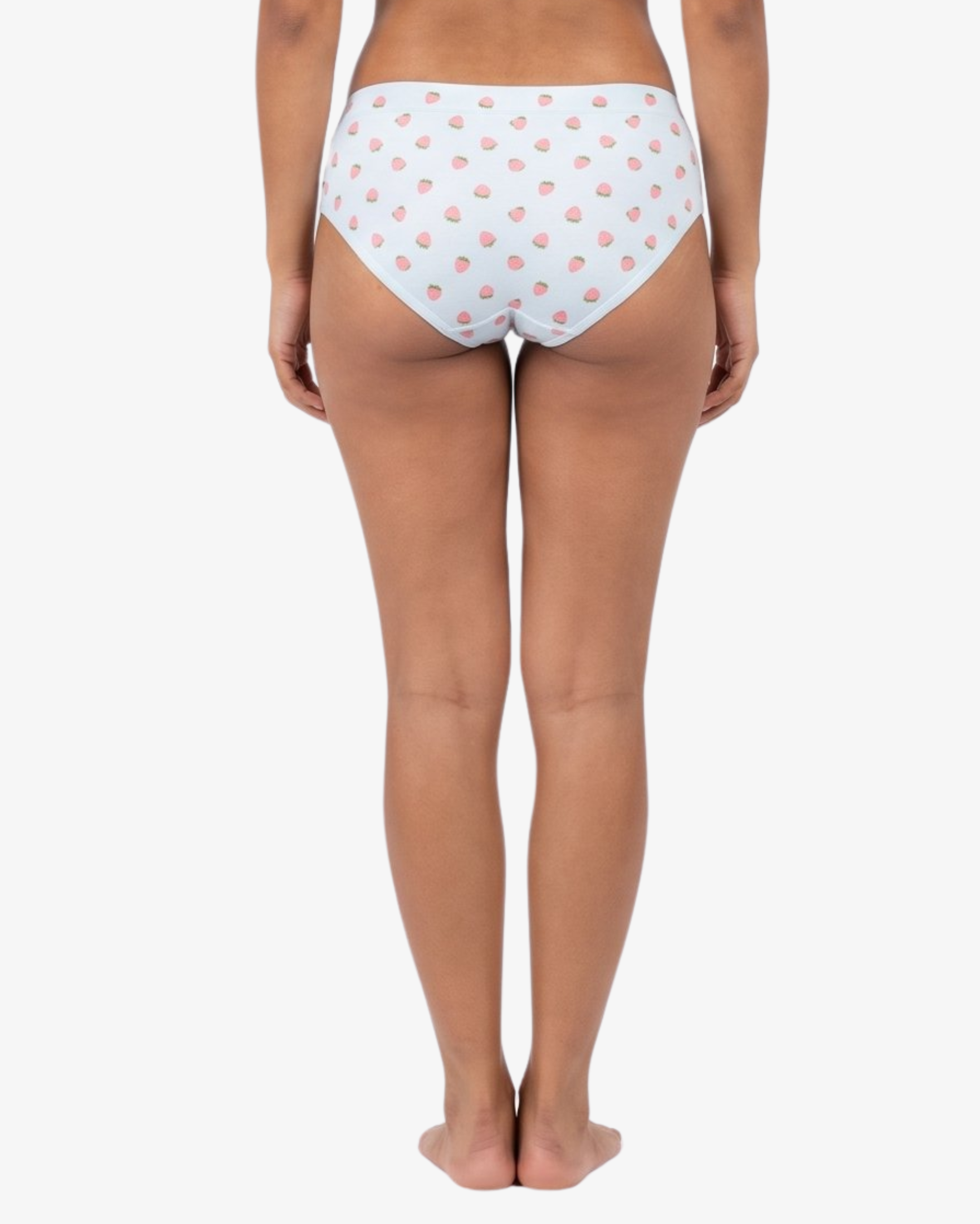 Rear view of a model wearing blue hipster bottoms with a pink strawberry pattern, set against a plain light gray background.