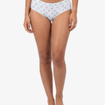 A model wearing blue bikini bottoms with a pink strawberry pattern, shown from the waist down against a light gray background.