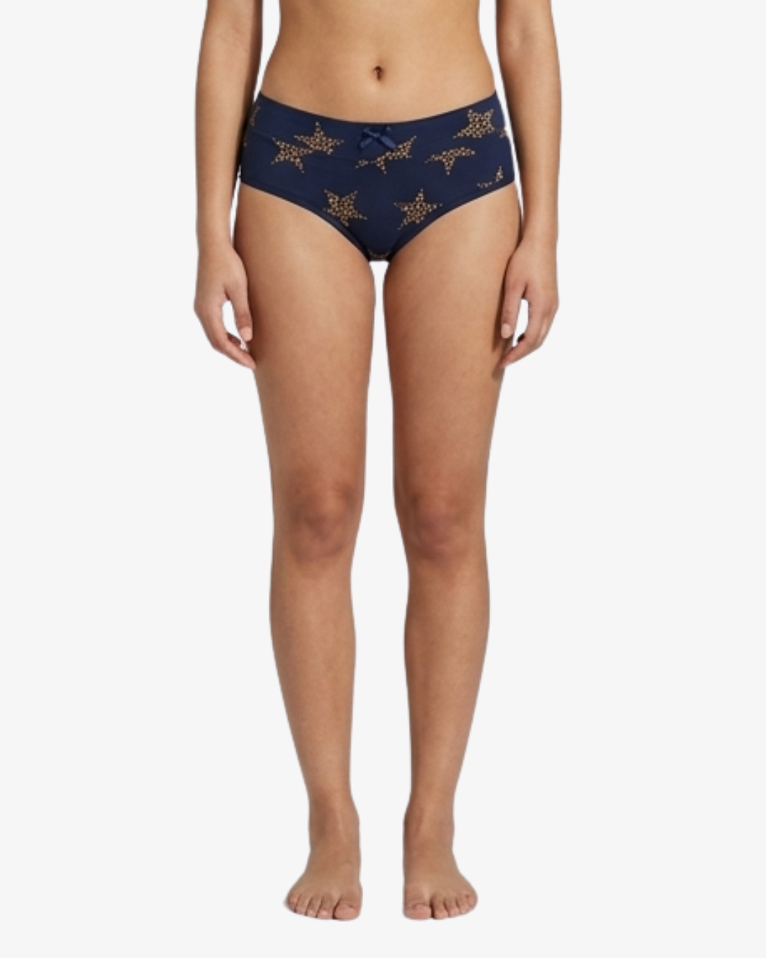 A model is shown from the waist down wearing navy blue bikini bottoms with a gold star pattern, set against a plain white background.