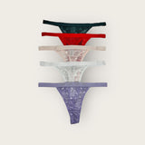 Five pairs of women's underwear in various colors on a white background