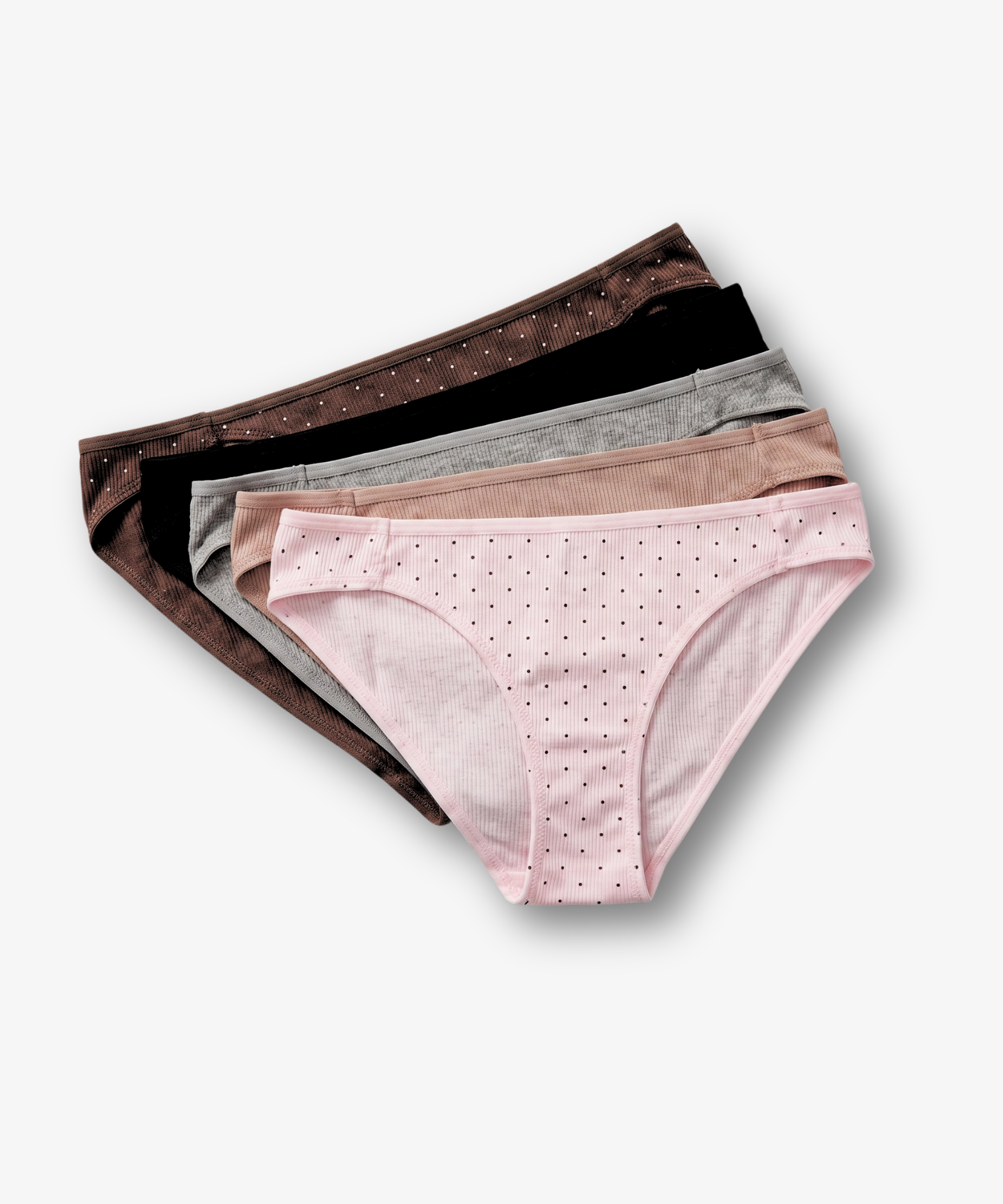 A stack of five women's bikini bottoms in different colors, each with small polka dots, arranged diagonally on a light gray background.