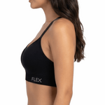 Woman wearing a black sports bra with 'FLEX' branding on a white background