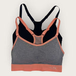 Multicolored sports bra with 'Flex' branding on a light gray background