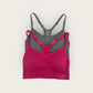 Pink and gray bra set on a light beige background
