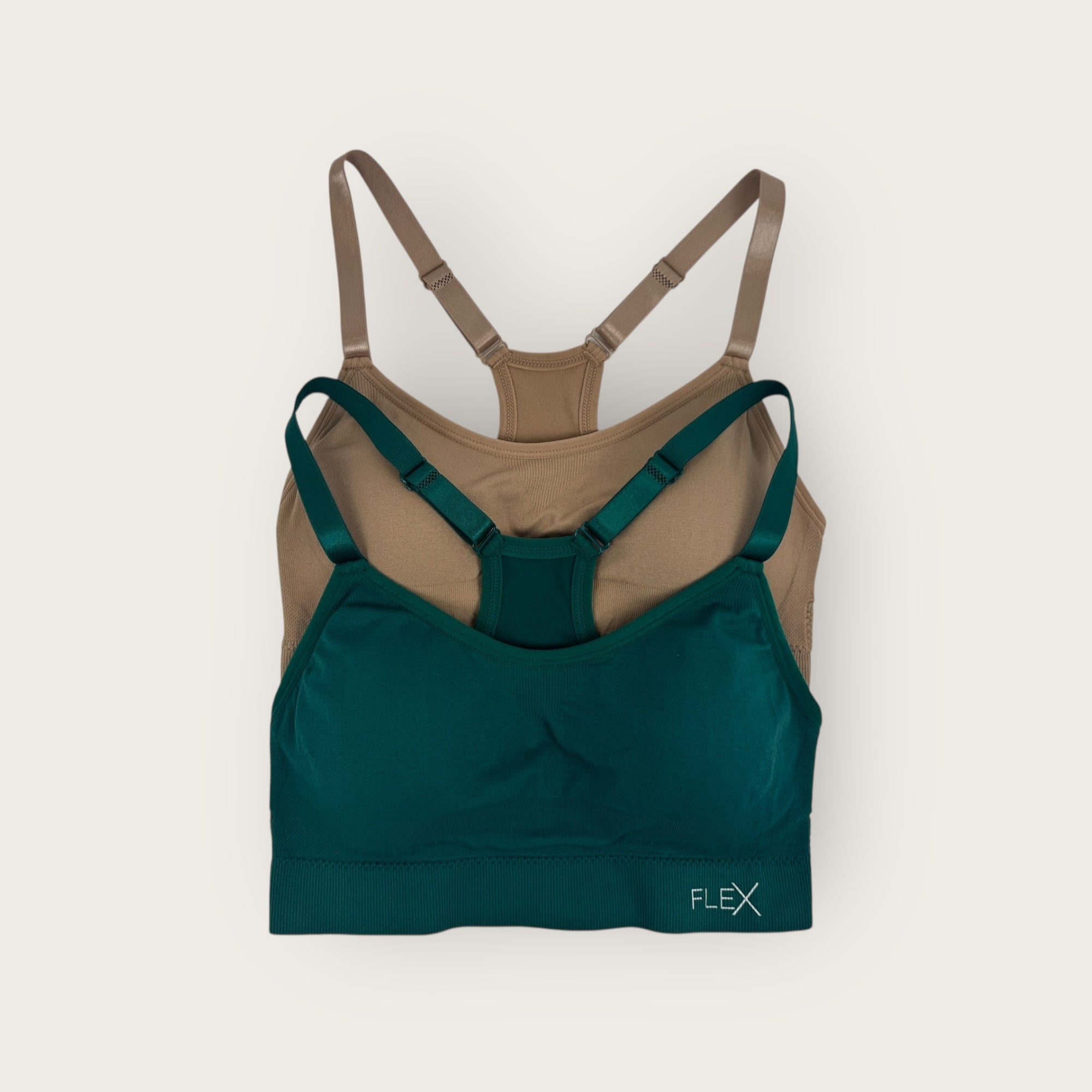Green and brown sports bra with 'FLEX' branding on a beige background