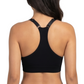 Woman in a black sports bra against a white backround.