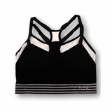 Black sports bra with white and gray stripes on a white background