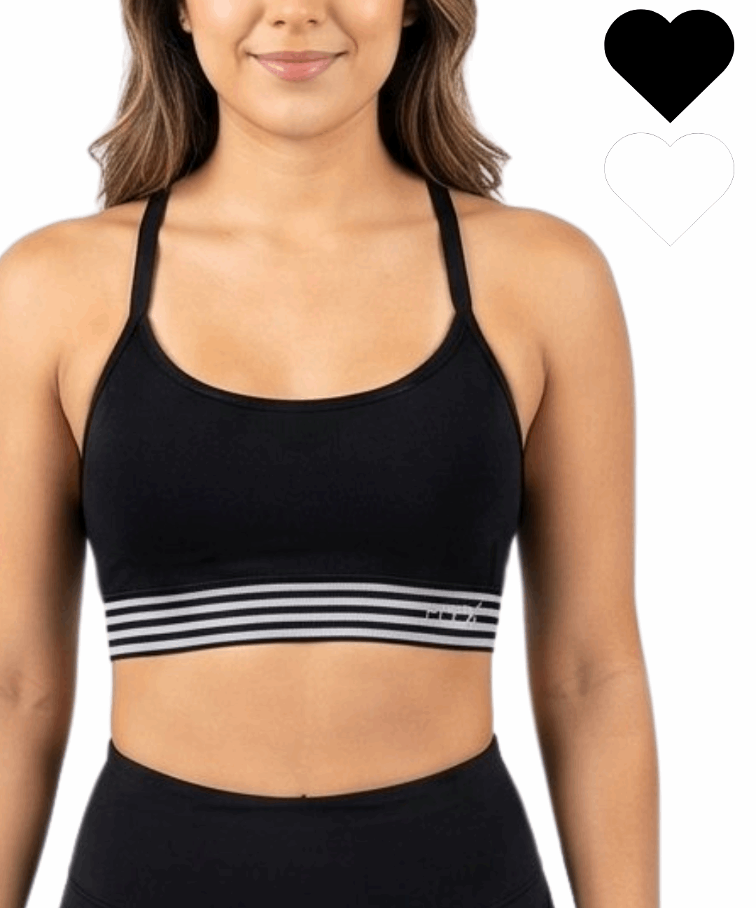 Woman wearing a black sports bra with striped design on a white background