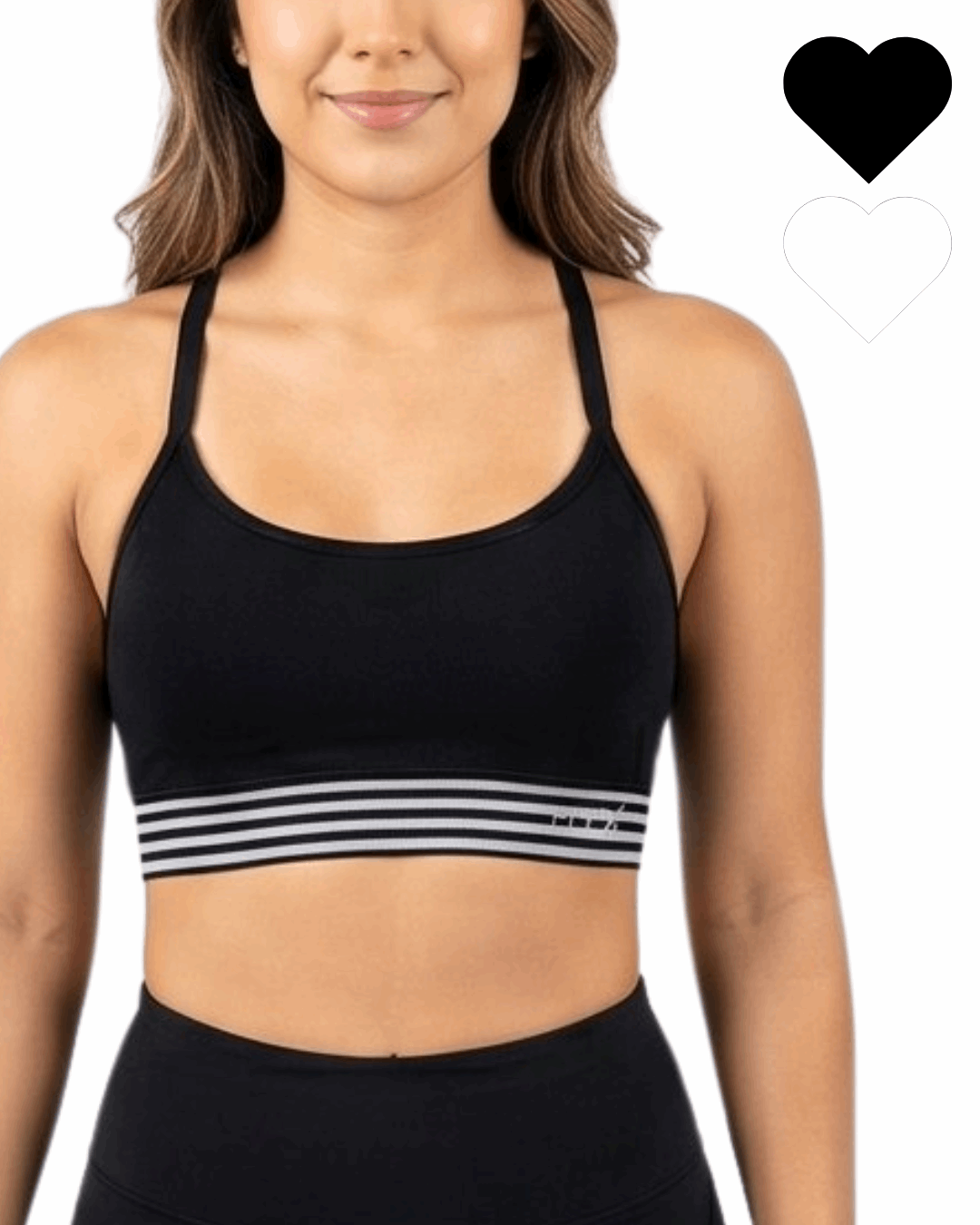 Woman wearing a black sports bra with striped design on a white background