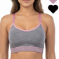 Woman wearing a gray sports bra with pink straps and trim on a white background