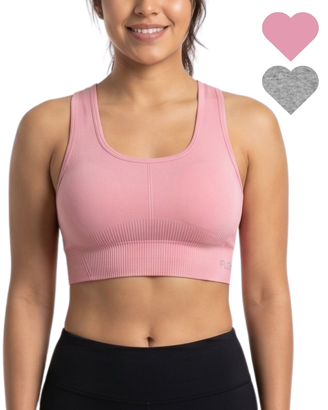 Woman wearing a pink sports bra with heart icons on a white background