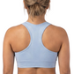 Person wearing a light blue sports bra and black leggings on a white background