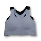 Blue and black sports bra on a white background