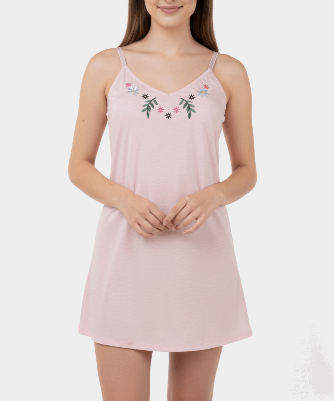 Pink nightgown with floral embroidery on a white background