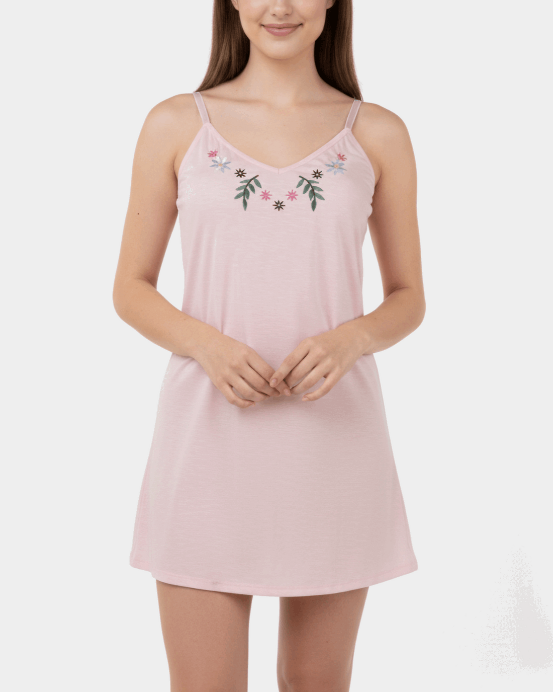 Pink nightgown with floral embroidery on a white background
