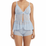 Woman wearing a light blue lace lingerie set on a white background