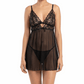 Woman wearing a black lace lingerie set on a white background