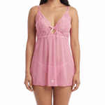 Woman wearing a pink lace babydoll lingerie on a white background