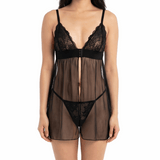 Woman wearing a black lace lingerie set on a white background