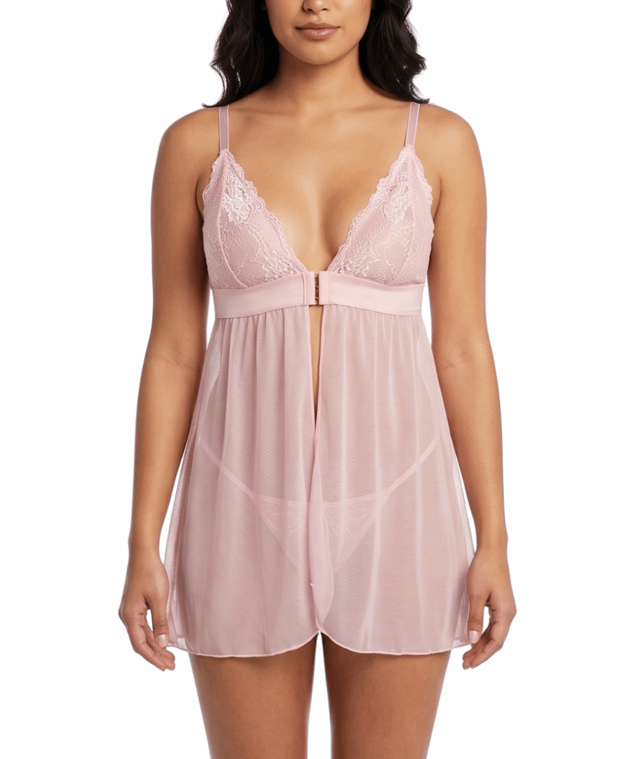 Woman wearing a pink lace nightgown on a white background