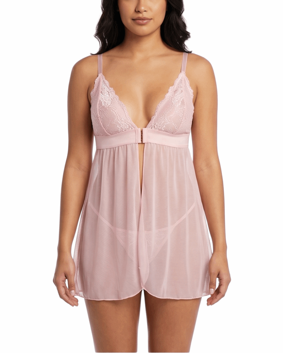 Woman wearing a pink lace nightgown on a white background