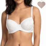 Woman wearing a white bra with a plain background