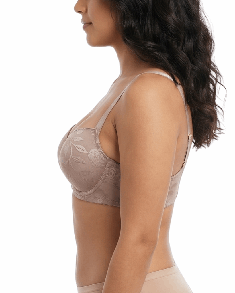 Woman wearing a beige bra on a white background